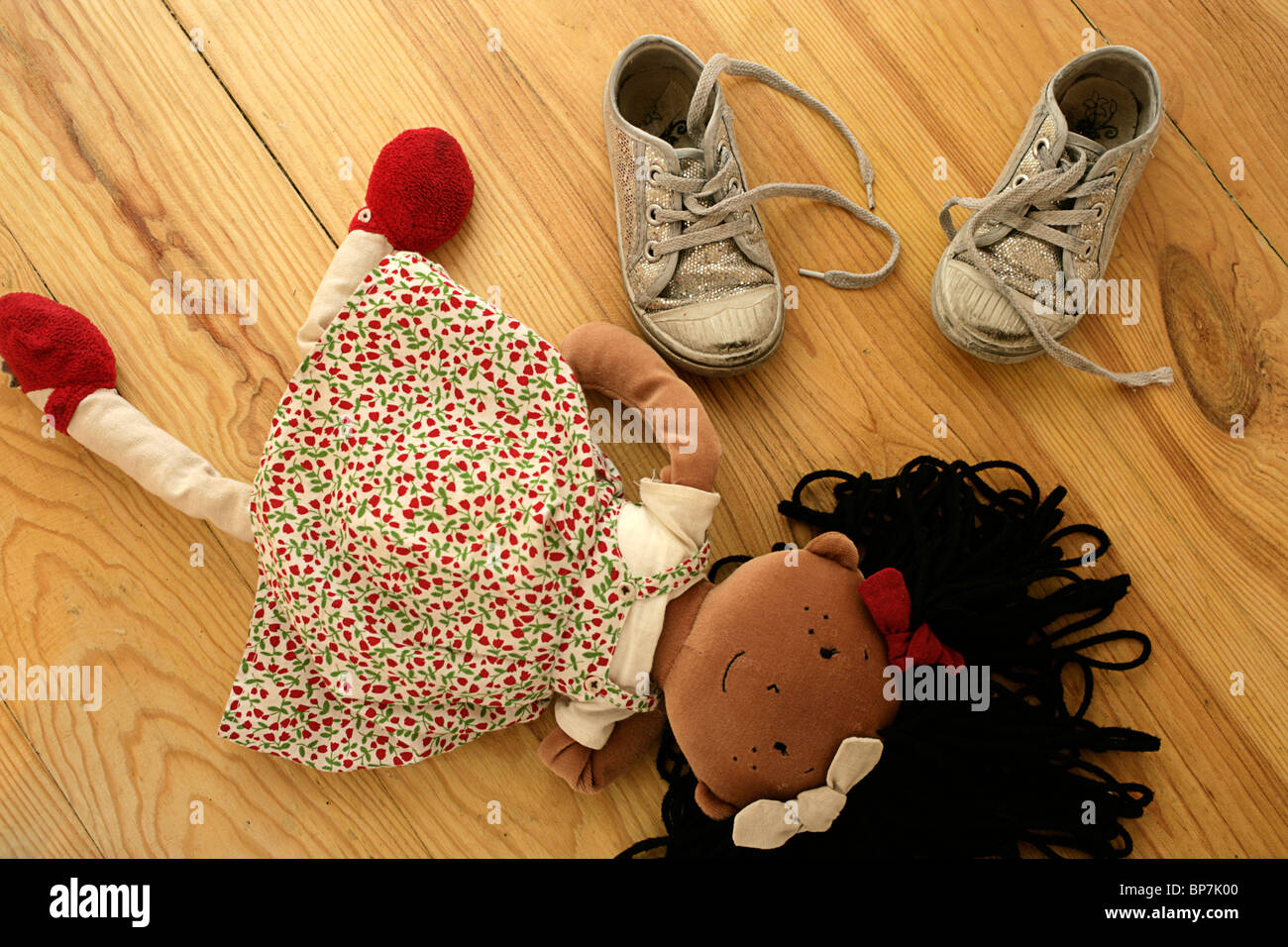 Child's ragdoll and shoes Stock Photo - Alamy