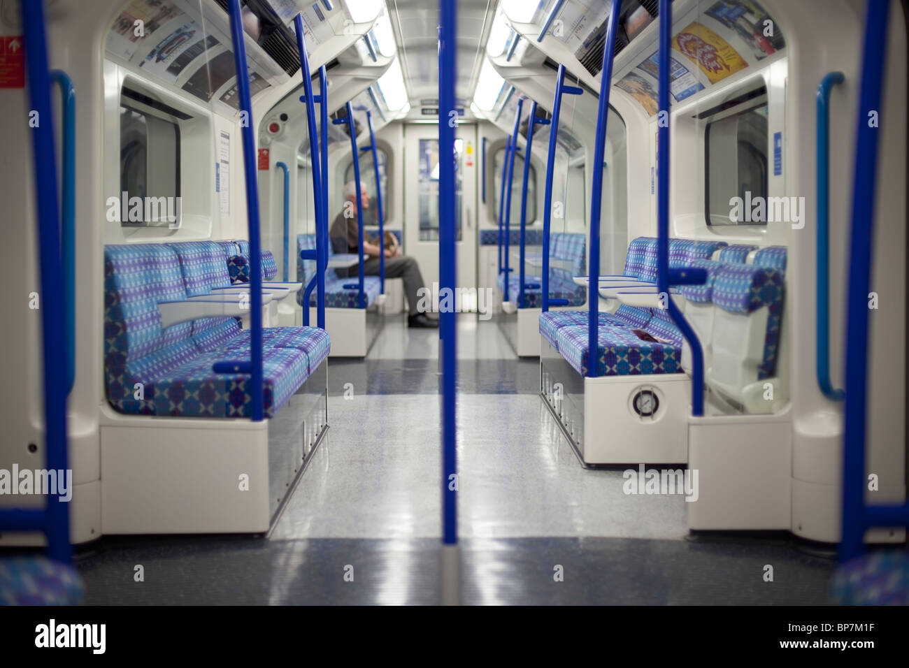London underground train carriage with one passenger Stock Photo Alamy