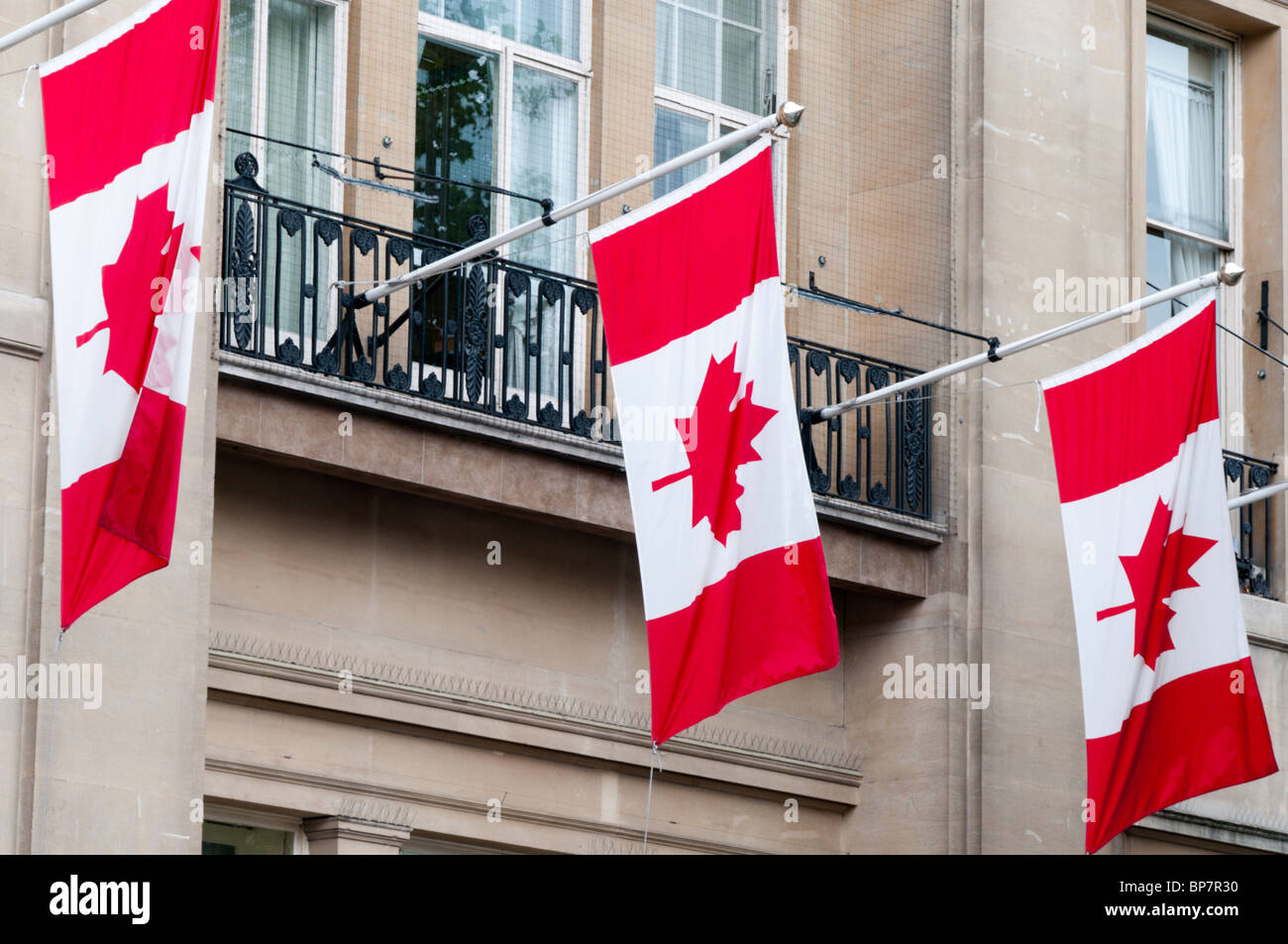 The Canadian national flag flying from Canada House on Trafalgar Square, London Stock Photo