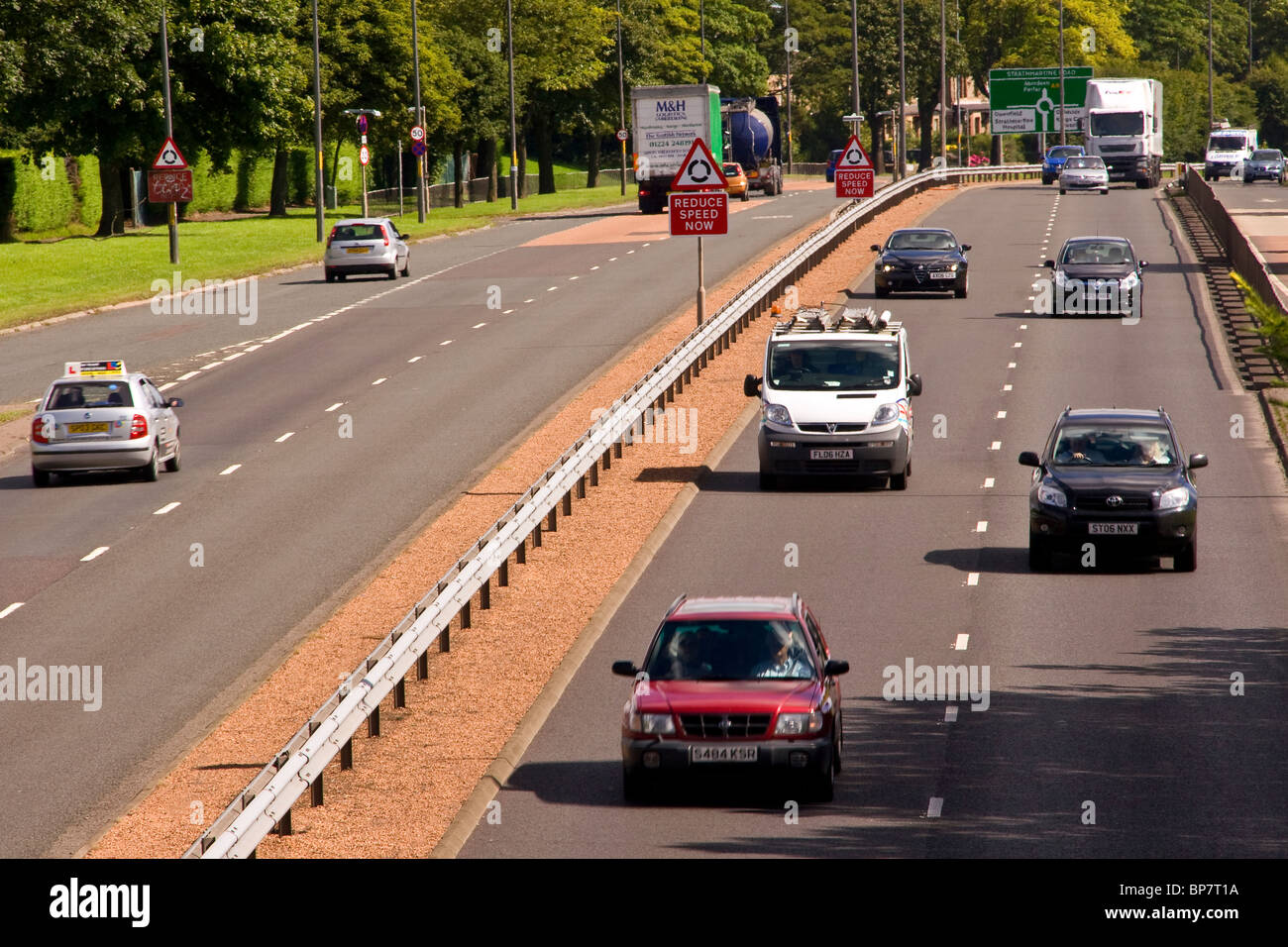 Vehicles travelling on a busy section of the Kingsway West dual carriageway in urban Dundee, UK Stock Photo