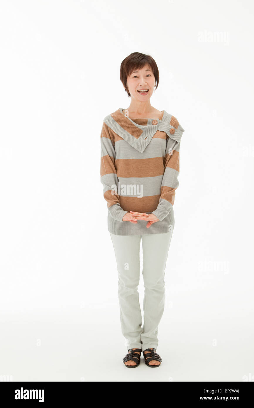 Mature japanese woman smiling hi-res stock photography and images - Alamy