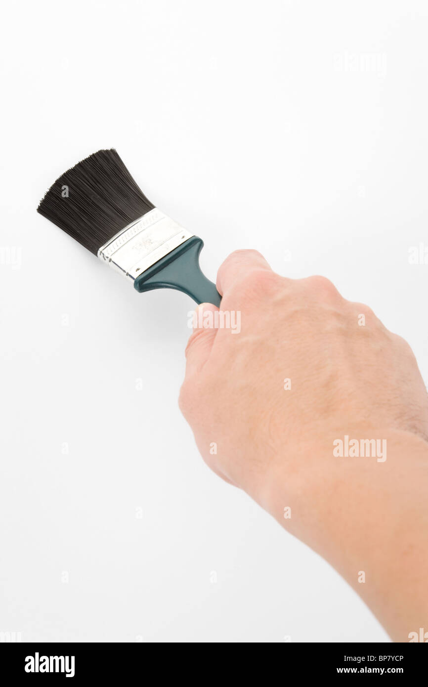 Hand holding a brush, Brushing Stock Photo Alamy