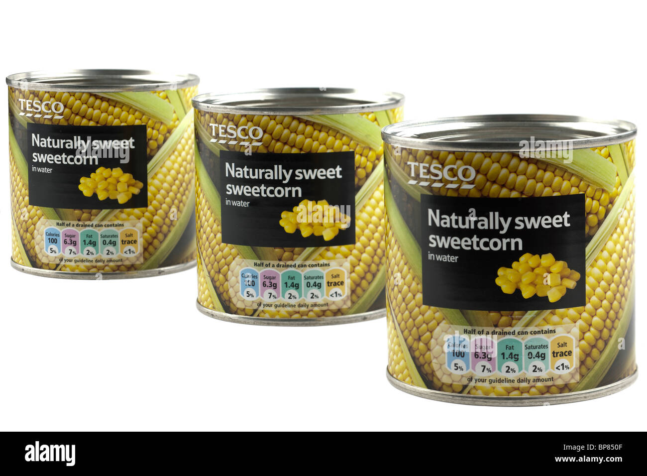 Three cans of Tesco naturally sweet sweetcorn in water Stock Photo Alamy