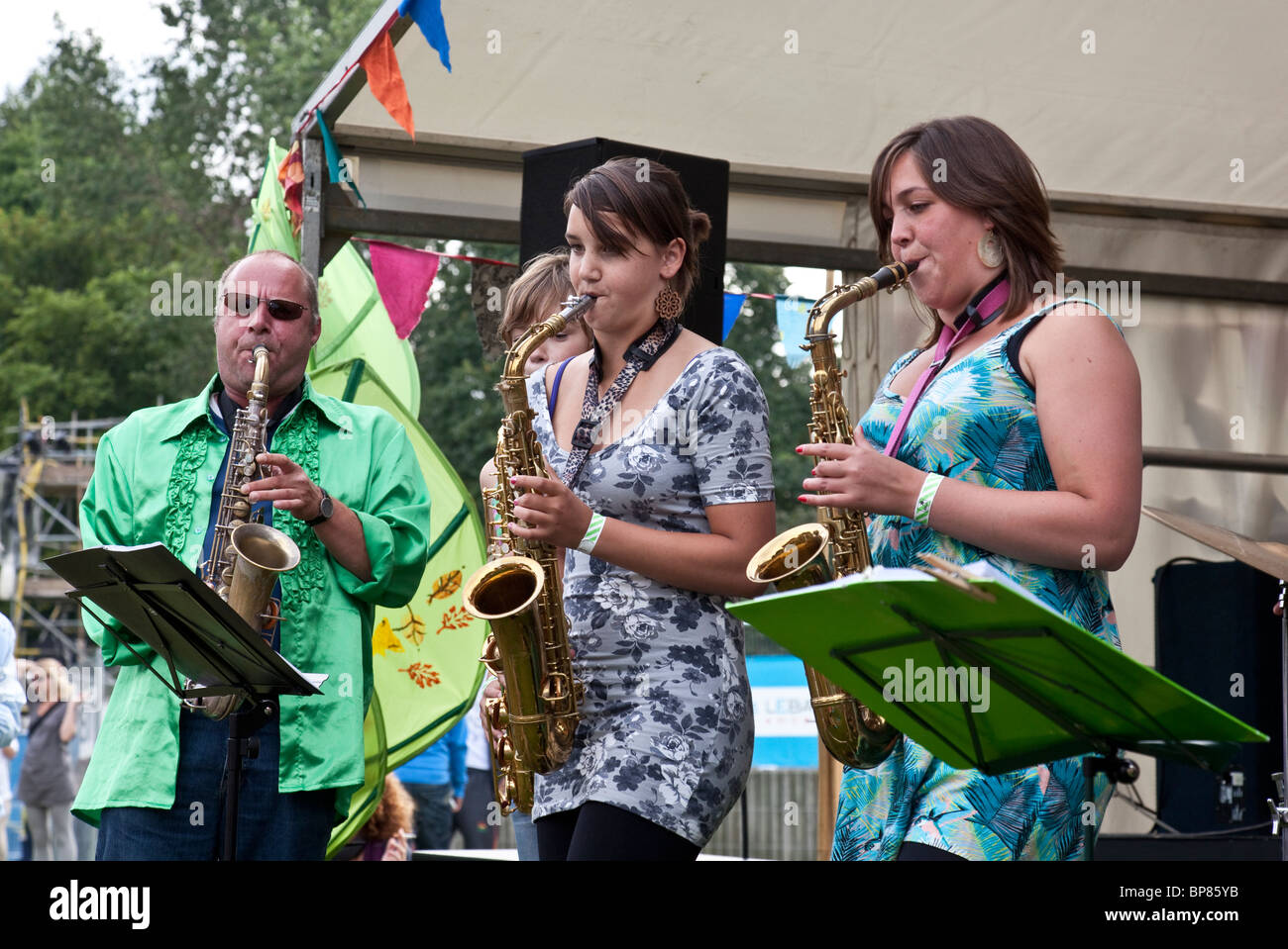 Three saxophonists from the Dutch big band Stroat Ensemble, performing at the 2010 Edinburgh Mela at Leith Links Stock Photo