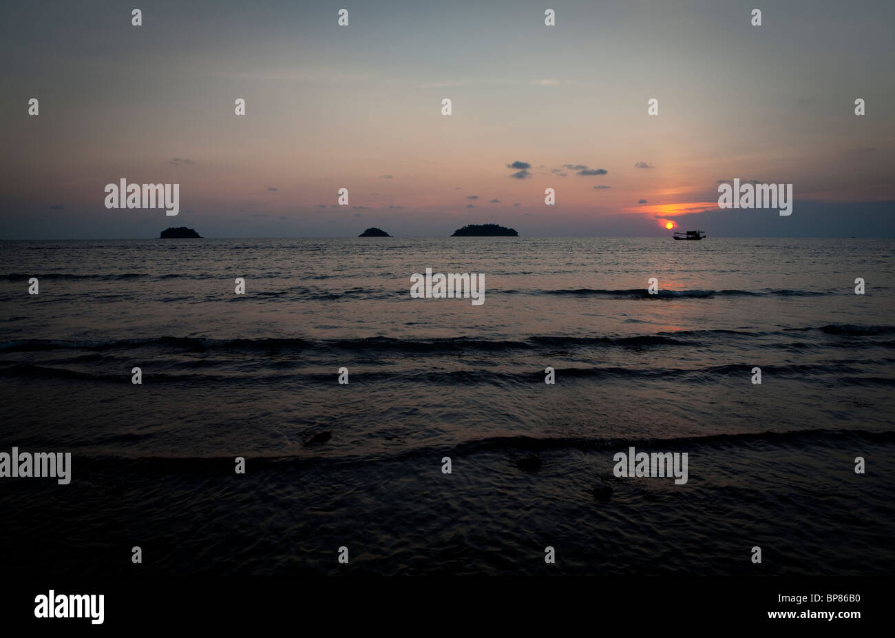 Fishing boat in sunset hi-res stock photography and images - Alamy