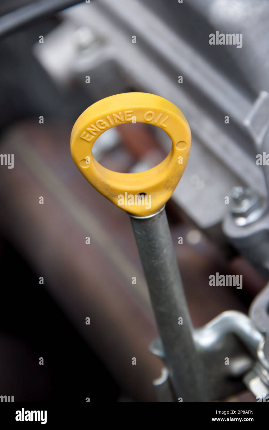 A close up of a car engine oil dip stick Stock Photo