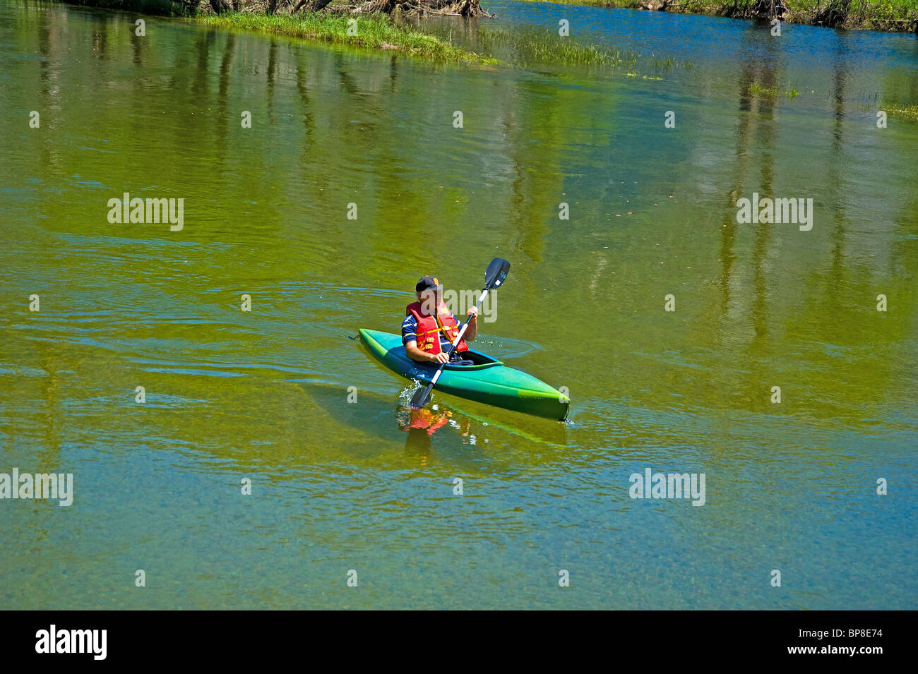 tourist man canoe Mersed river Yosemite National Park canoing Stock
