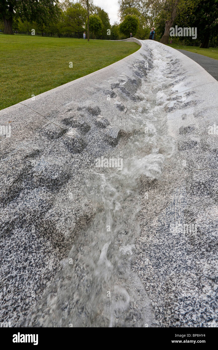 Endless Flow down the Diana Memorial Fountain. Water gushes and cascades over the intricately carved blocks of granite. Stock Photo