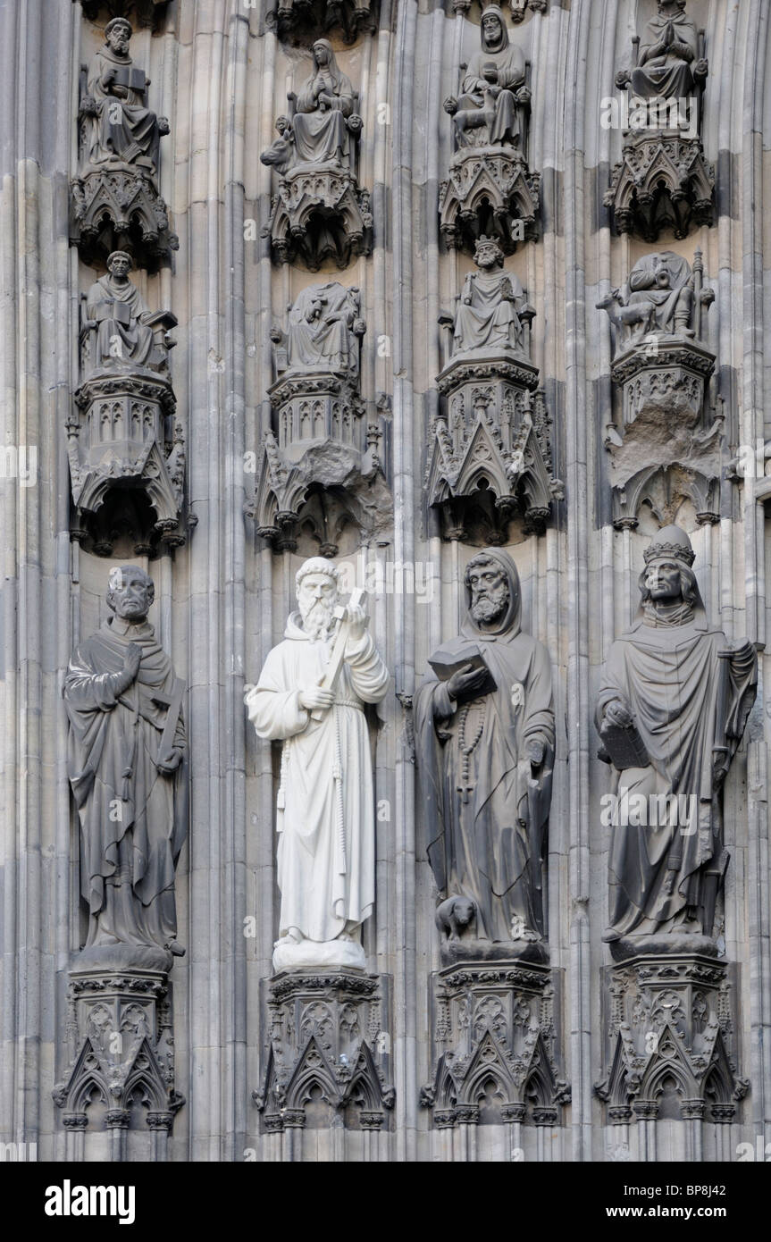 Cologne / Koln, Nordrhein-Westfalen, Germany. Cologne Cathedral / Kolner Dom. (1880) Renewed Statues on facade Stock Photo