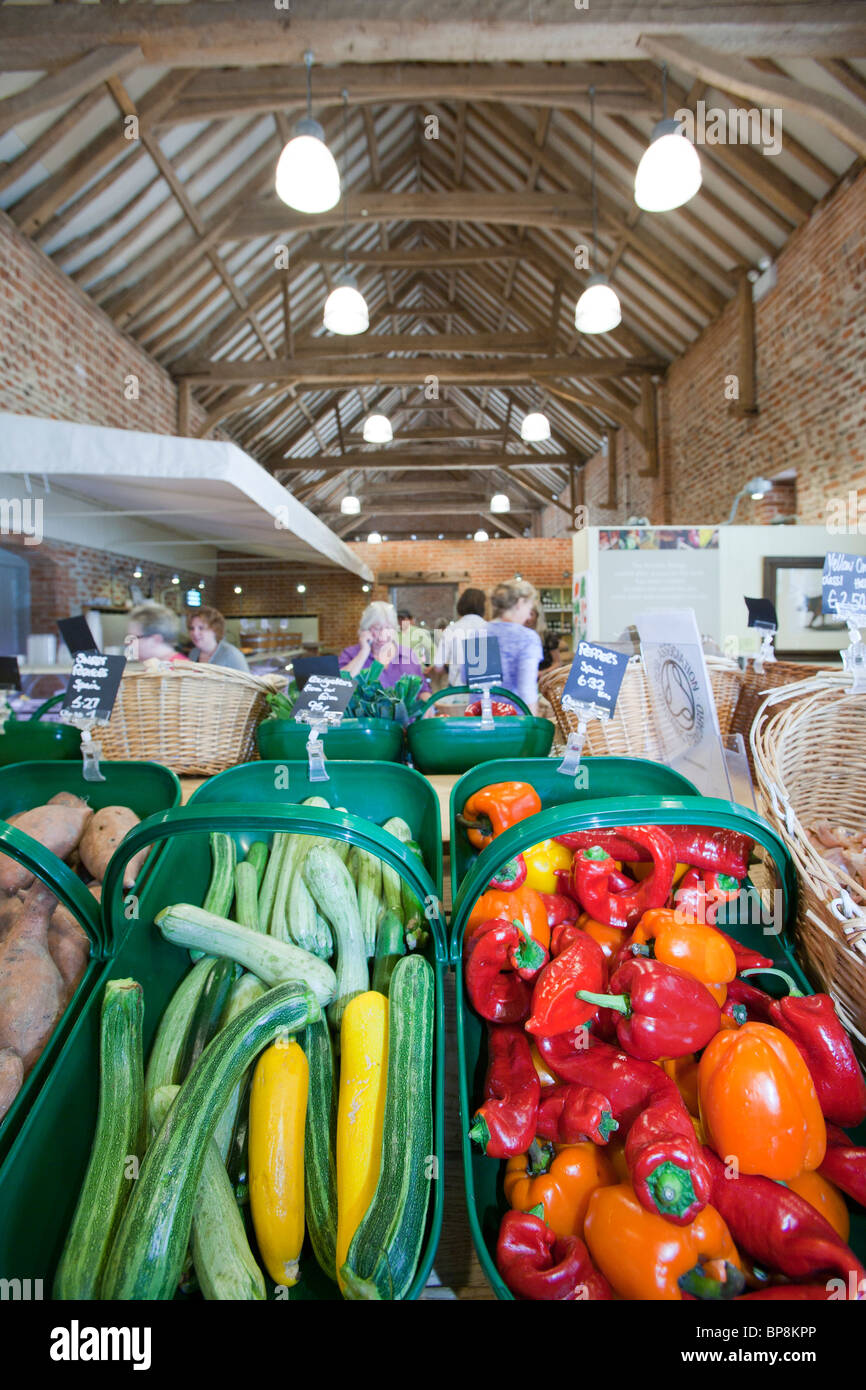 Home grown produce for sale at a farm shop in an old barn on a farm