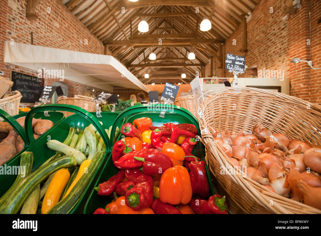 Home grown produce for sale at a farm shop in an old barn on a farm