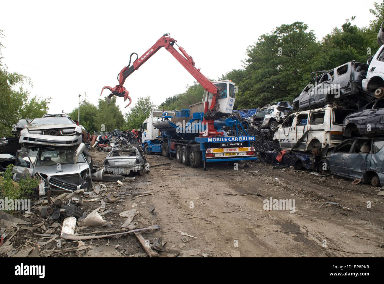 Cars being recycled in a scrapyard Stock Photo