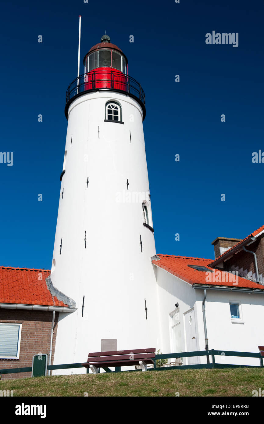 White lighthouse in little Dutch fishing village Urk Stock Photo - Alamy