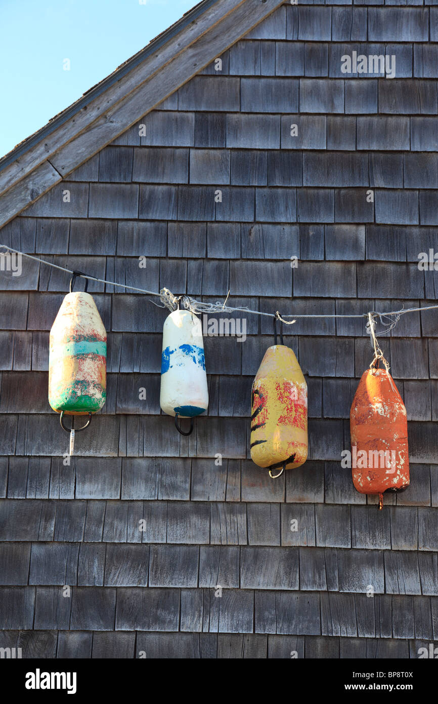 buoys hanging on wall in Peggys Cove Nova Scotia, Canada, North America. Photo by Willy Matheisl Stock Photo