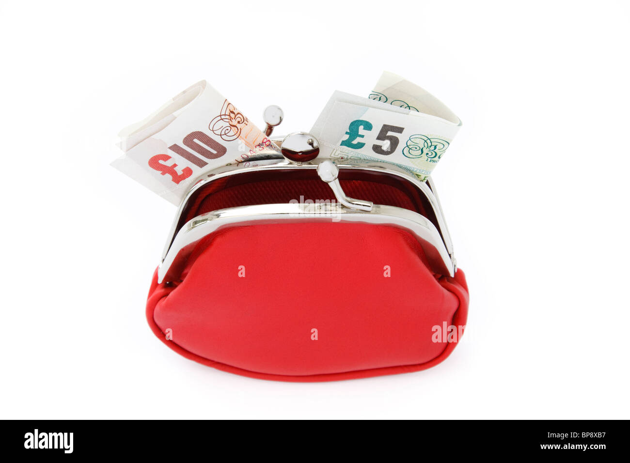 Red money purse containing ten pound and five pound notes isolated on a plain white background. UK, Britain Stock Photo