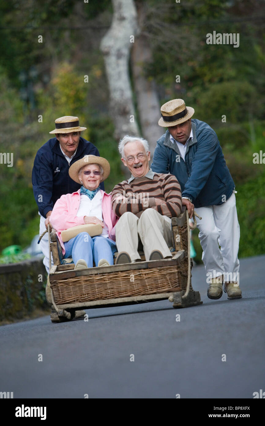 Elderly couple enjoying a Monte Toboggan Run, Funchal, Madeira, Portugal  Stock Photo - Alamy