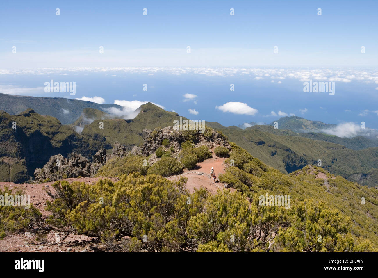 Hikers on Walking Track to Pico Ruivo Summit, Achada do Teixeira, Madeira, Portugal Stock Photo