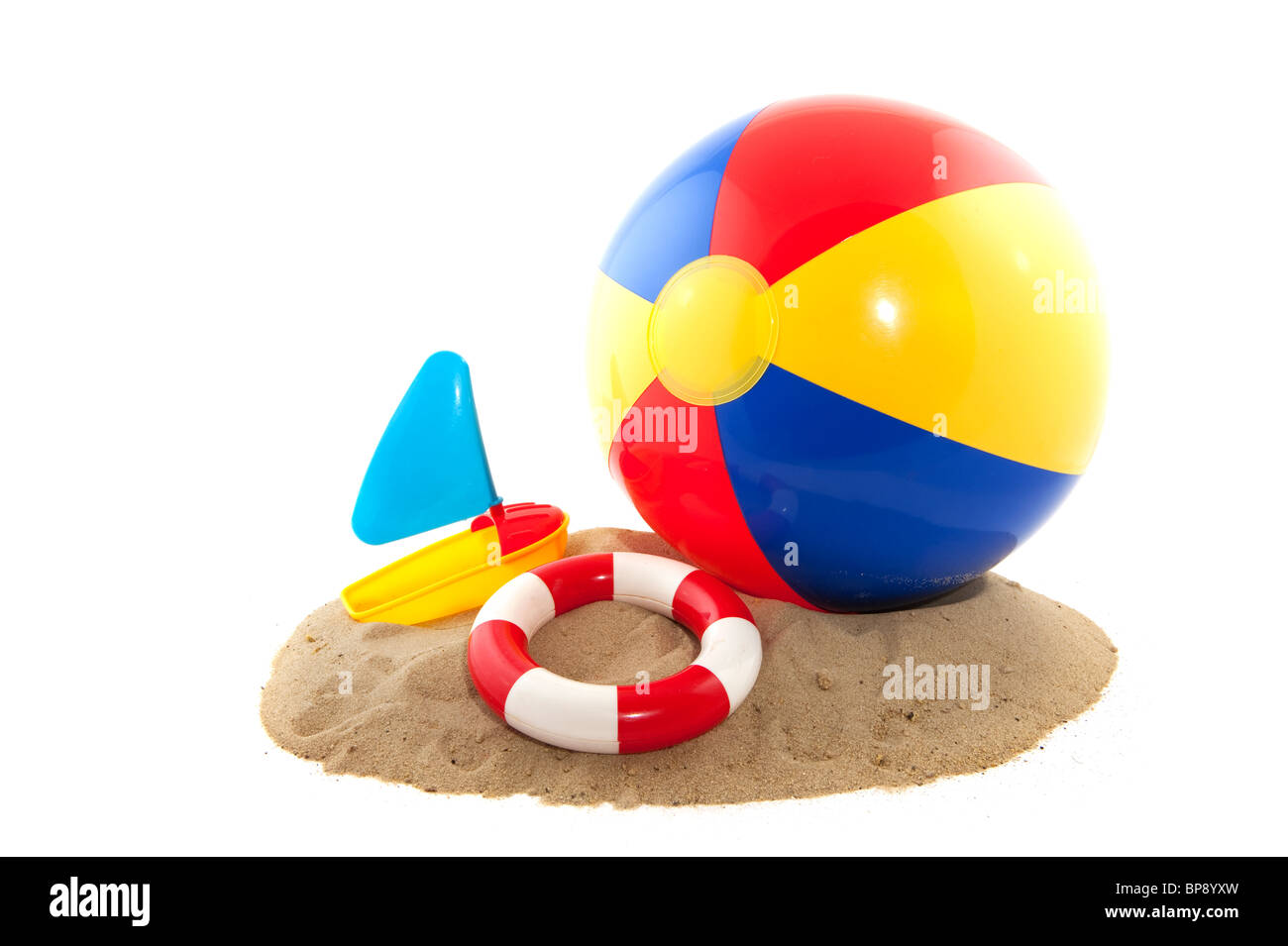 Beach ball with sand and bucket for the beach Stock Photo Alamy