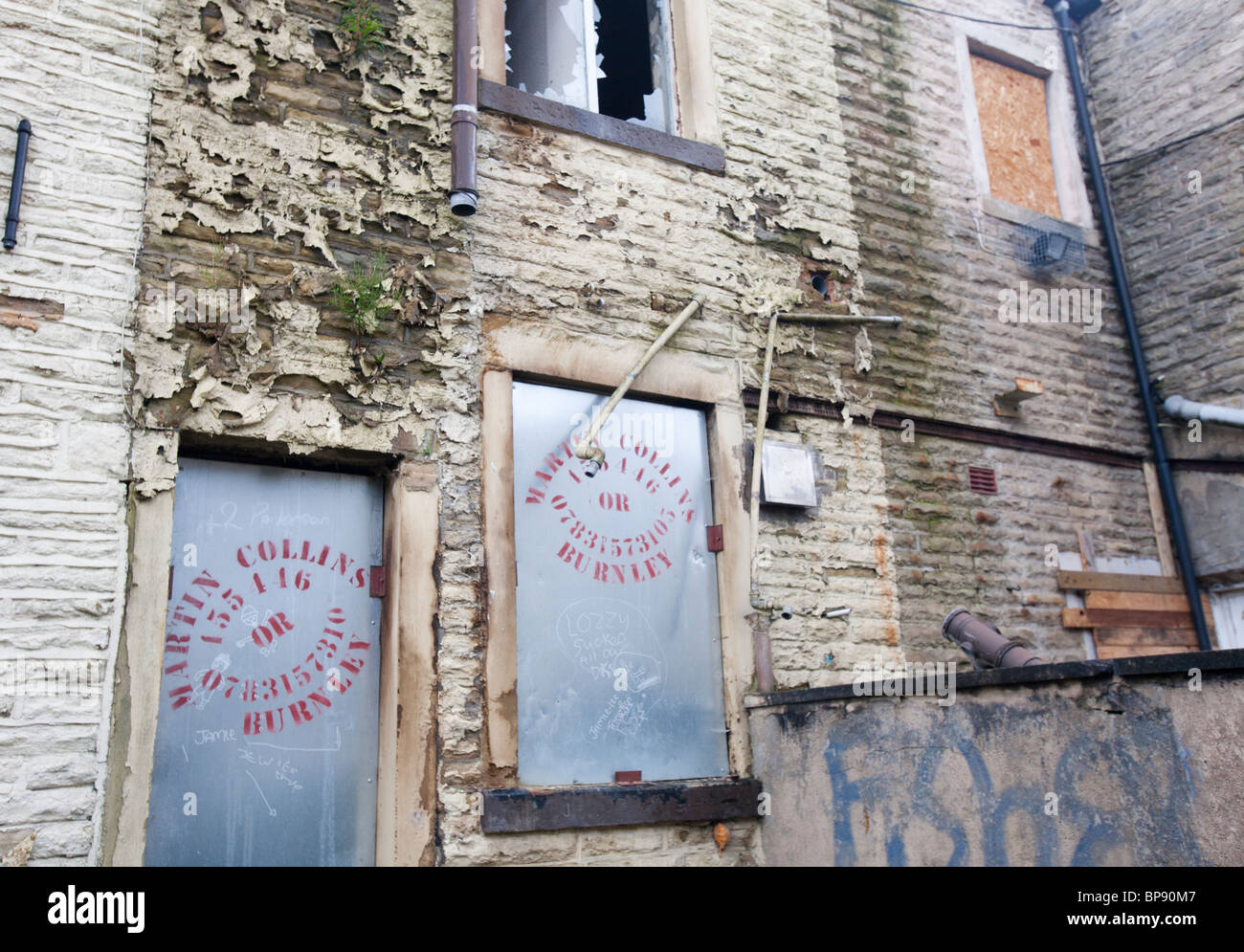 Boarded up terraced houses in the Burnley Wood area of Burnley, Lancashire UK, that have been
