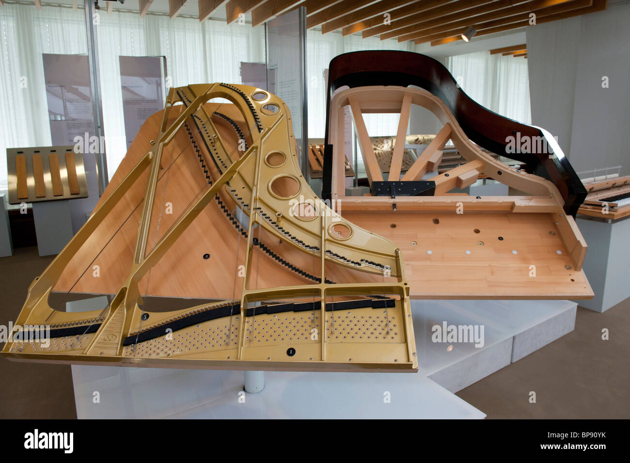 Display of modern piano manufacturing at Musikinstrumenten Museum or