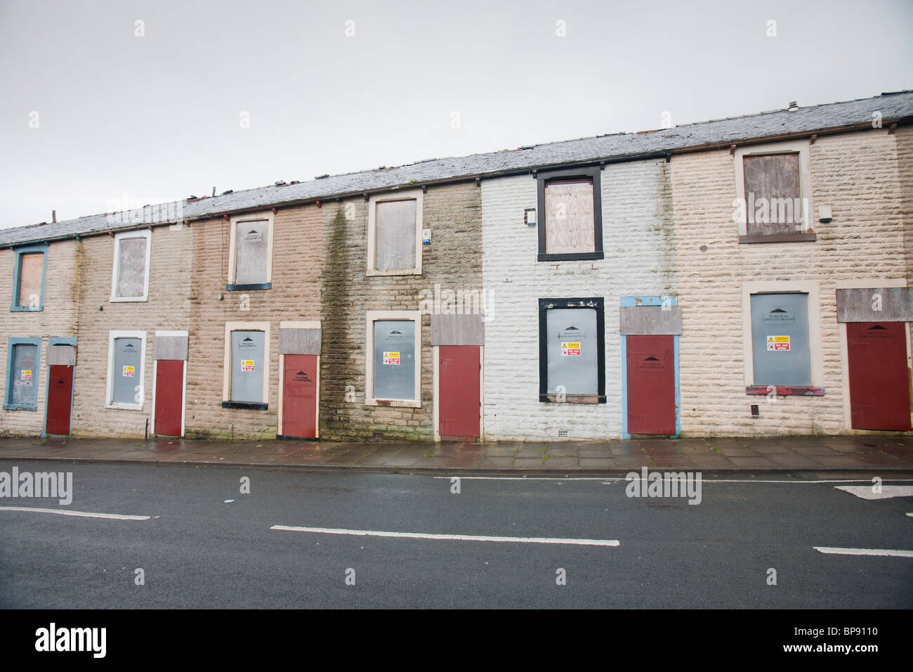 Boarded up terraced houses in the Burnley Wood area of Burnley, Lancashire UK, that have been