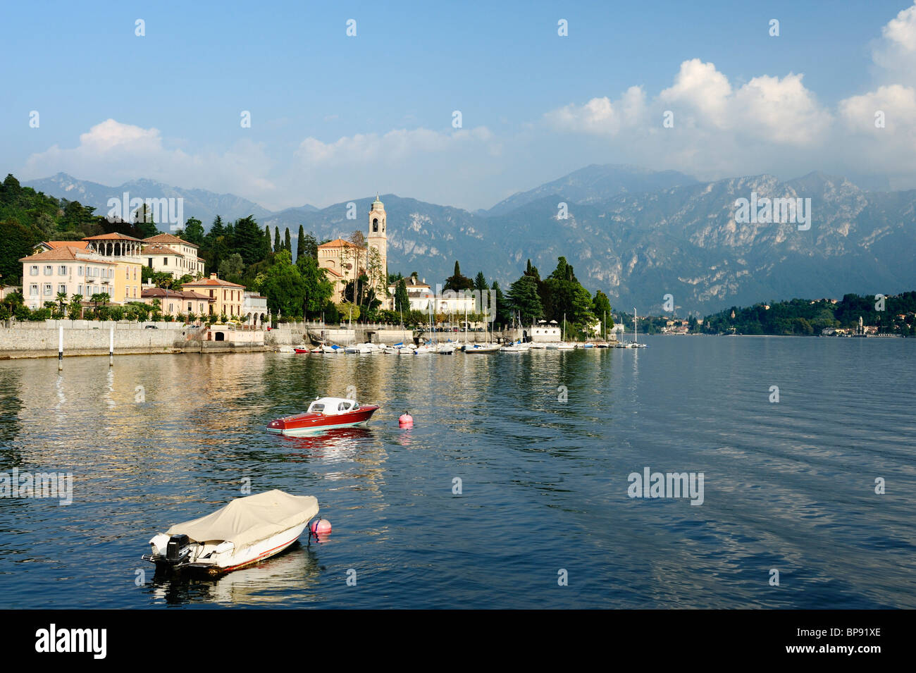 View over Lake Como to Tremezzo with Bergamo Alps in background, Lombardy, Italy Stock Photo