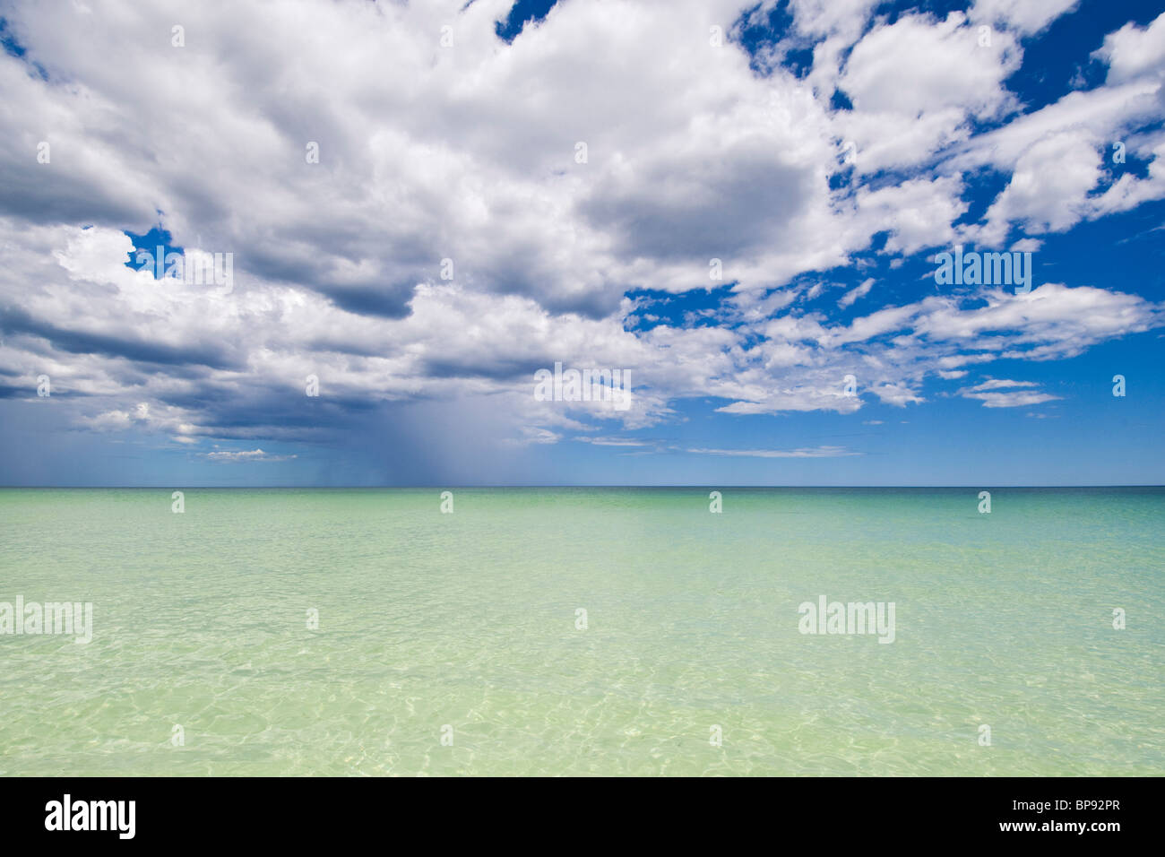 Storm clouds above emerald green water of Nuytsland Nature Reserve, Western Australia. Stock Photo