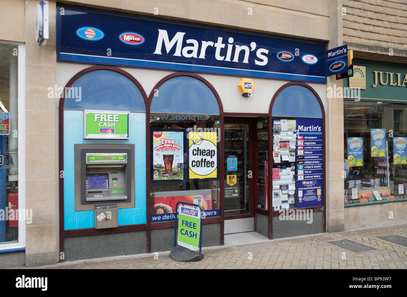 The shop front to a Martin's newsagents in the High Street, Stamford, Lincolnshire, UK Stock Photo