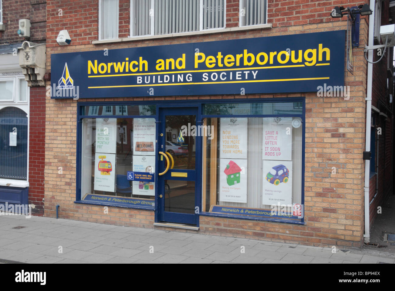 The logo and shop front of a branch of the Norwich and Peterborough Building Society, in St Ives, Cambridgeshire, UK. Stock Photo