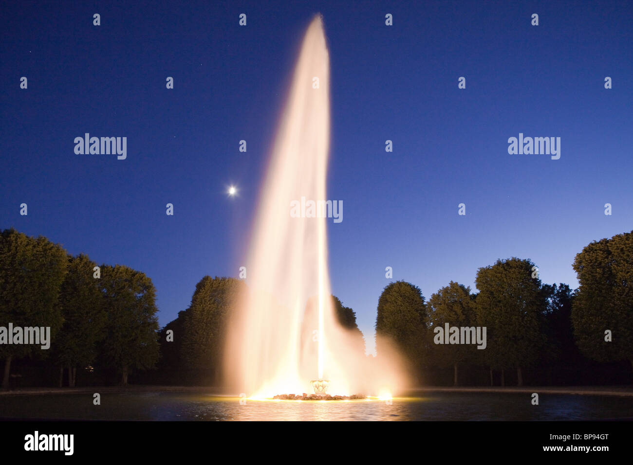 illumination of the Great Fountain in the Great Garden Herrenhausen in Hanover, moon, Hanover, Lower Saxony, northern Germany Stock Photo