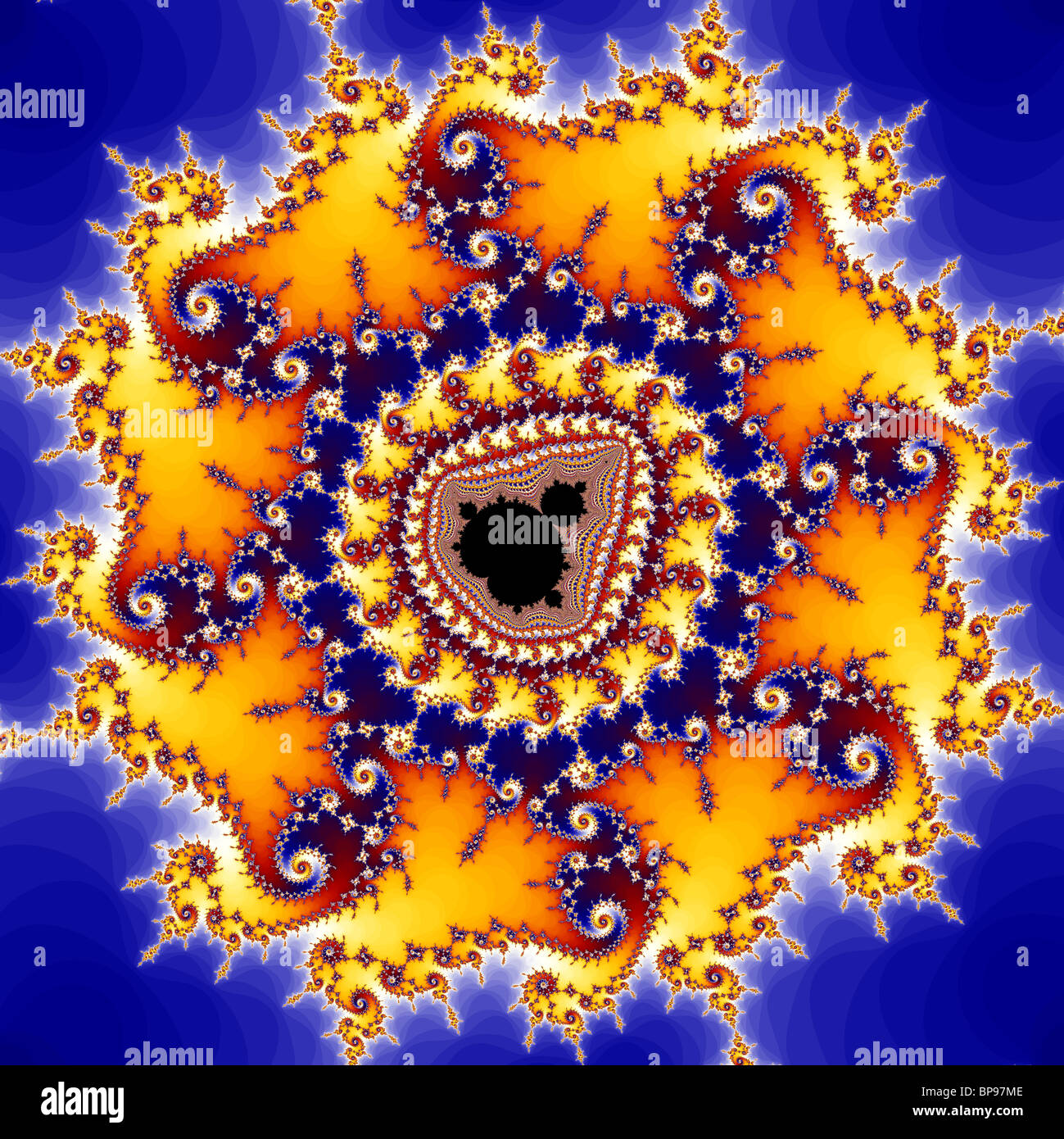 The Mandelbrot Set contains an infinite number of copies of itself ( 'mini Mandelbrots'), surrounded by complex patterns. Stock Photo