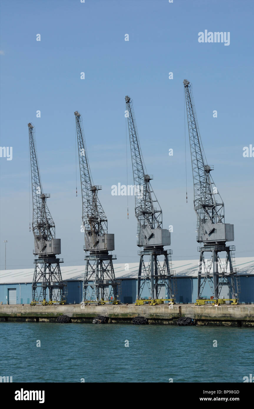 A row of dockside cranes at Southampton Docks, Hampshire, England, UK Stock Photo