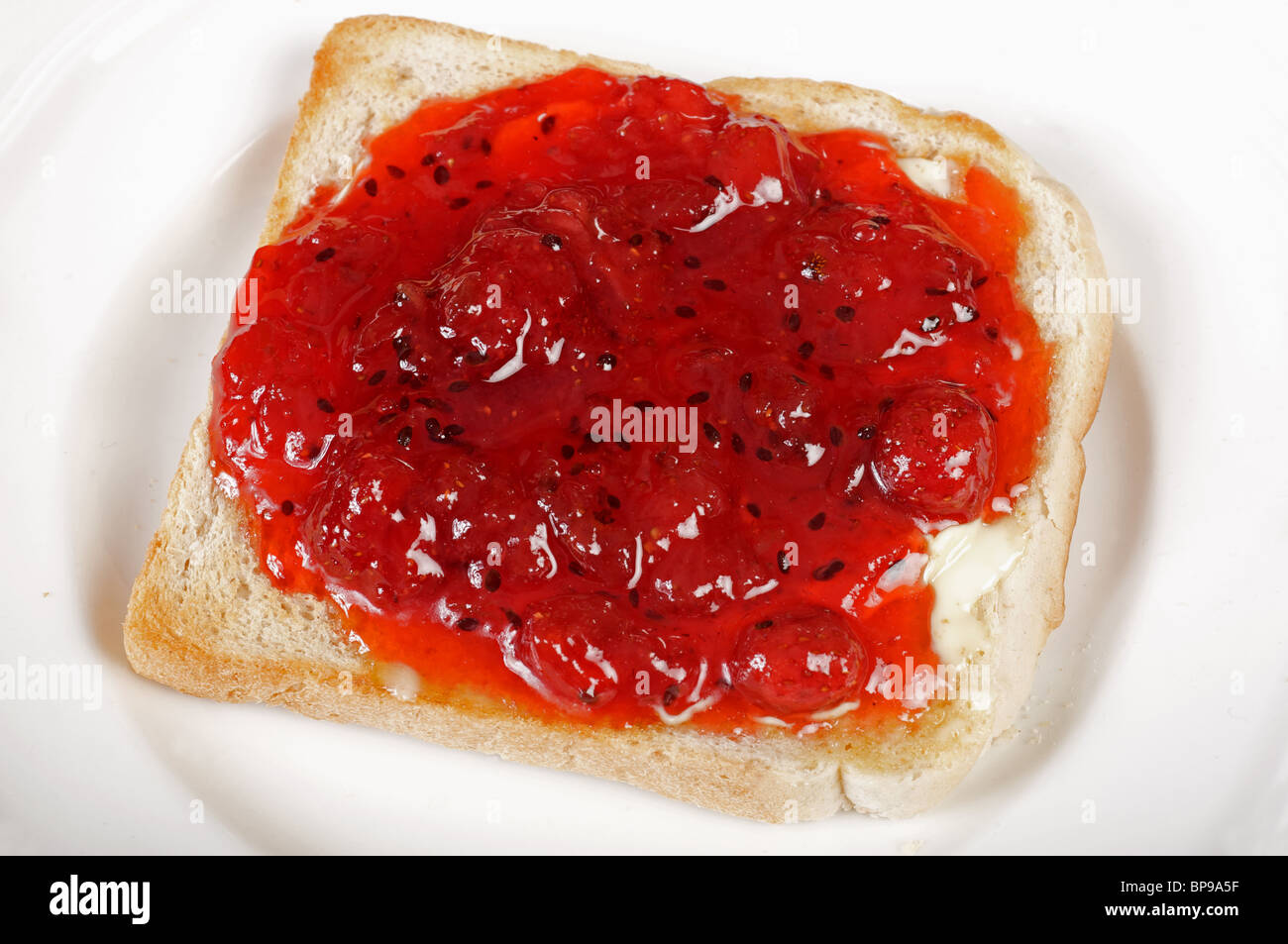 Homemade strawberry jam on toast Stock Photo Alamy