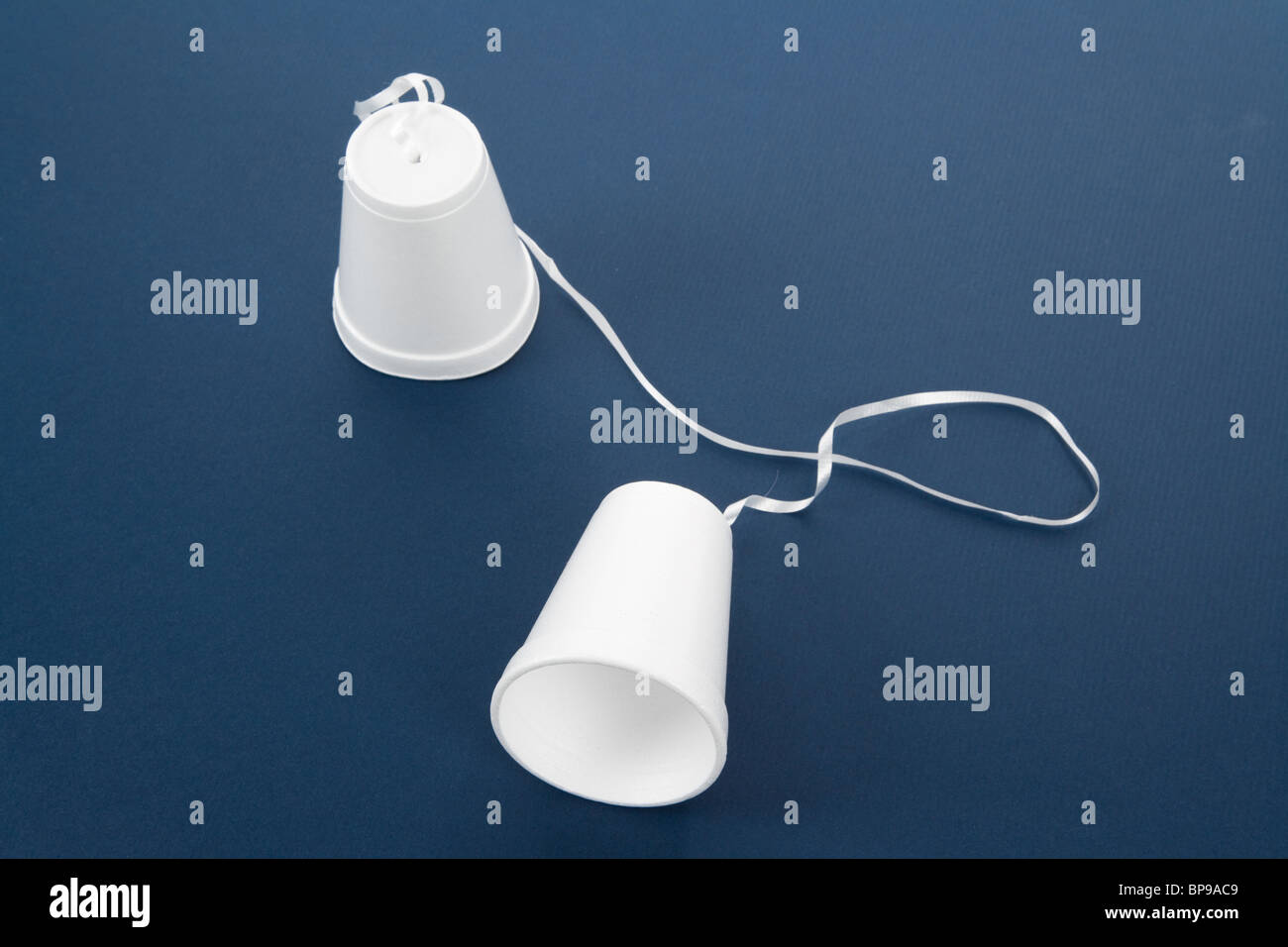 white Plastic Cup Phone, business concept Stock Photo - Alamy