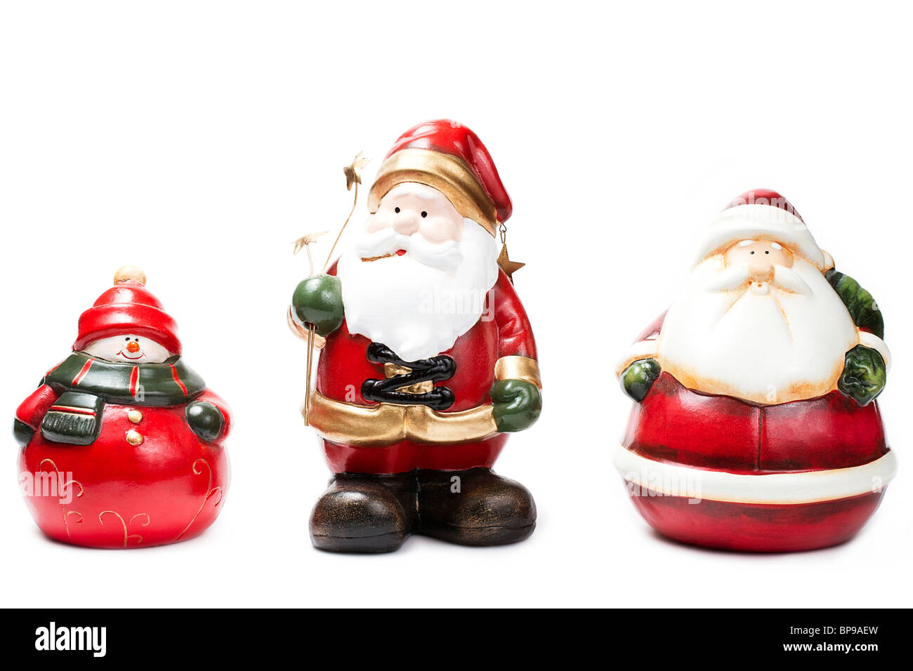 Santa, snowman and Santa holding stars on white background Stock Photo ...
