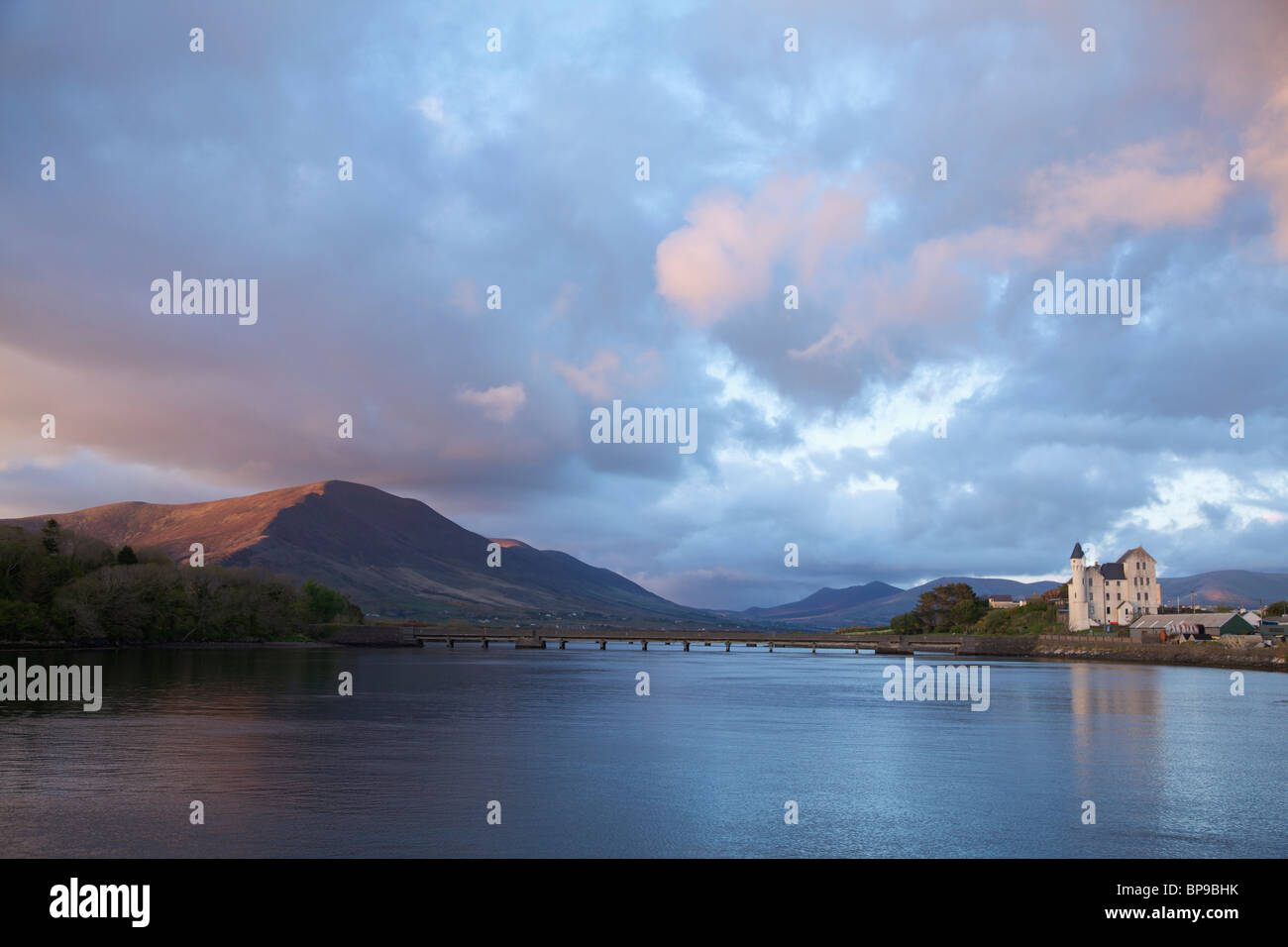 Caherciveen, County Kerry, Ireland; The Old Barracks Along The Water In The Evening Stock Photo