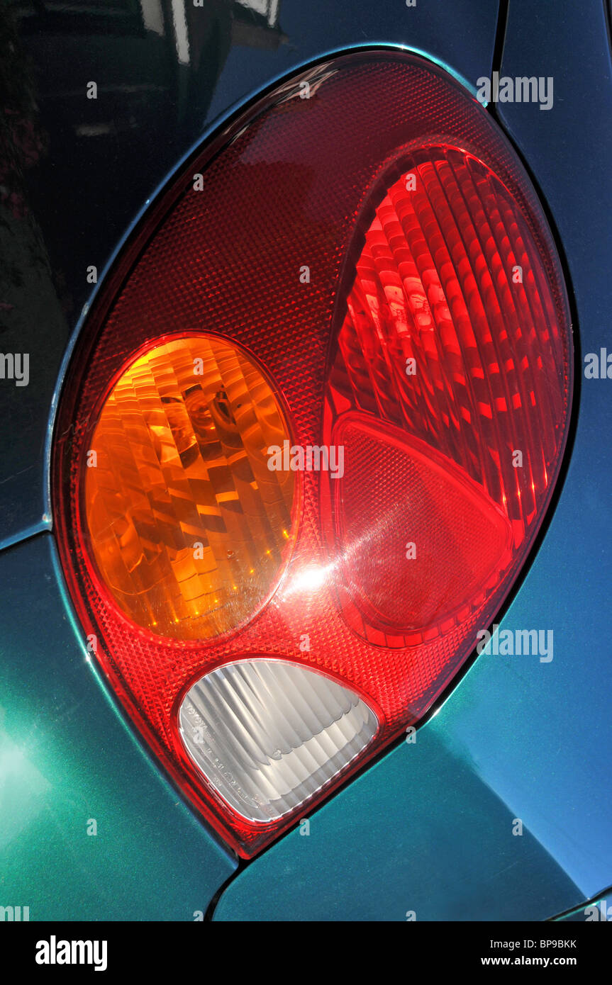 A hand on an indicator stick in the interior of a car also used to turn on  headlights Stock Photo - Alamy