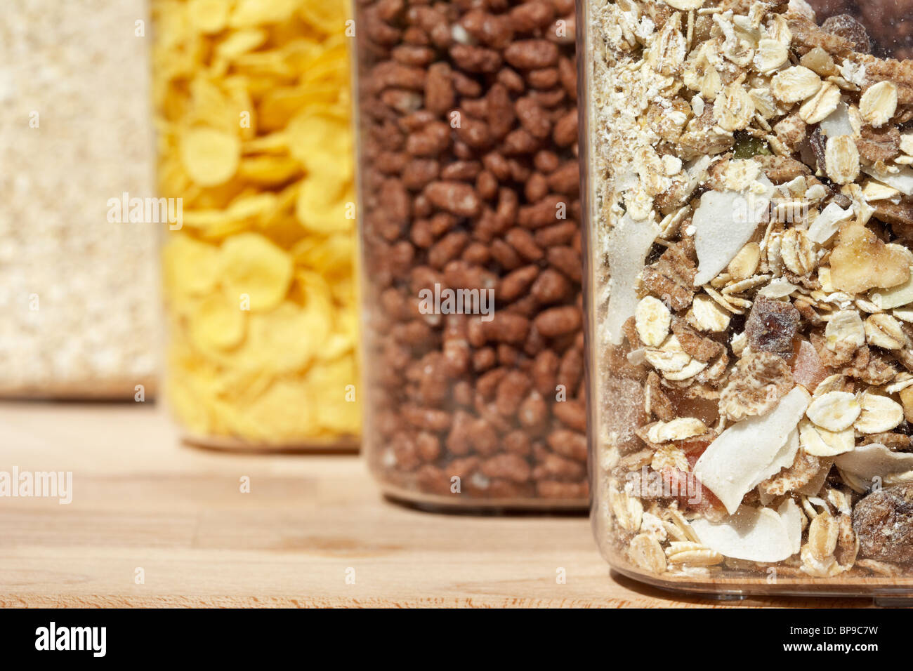 containers of different breakfast cereals including cornflakes coco
