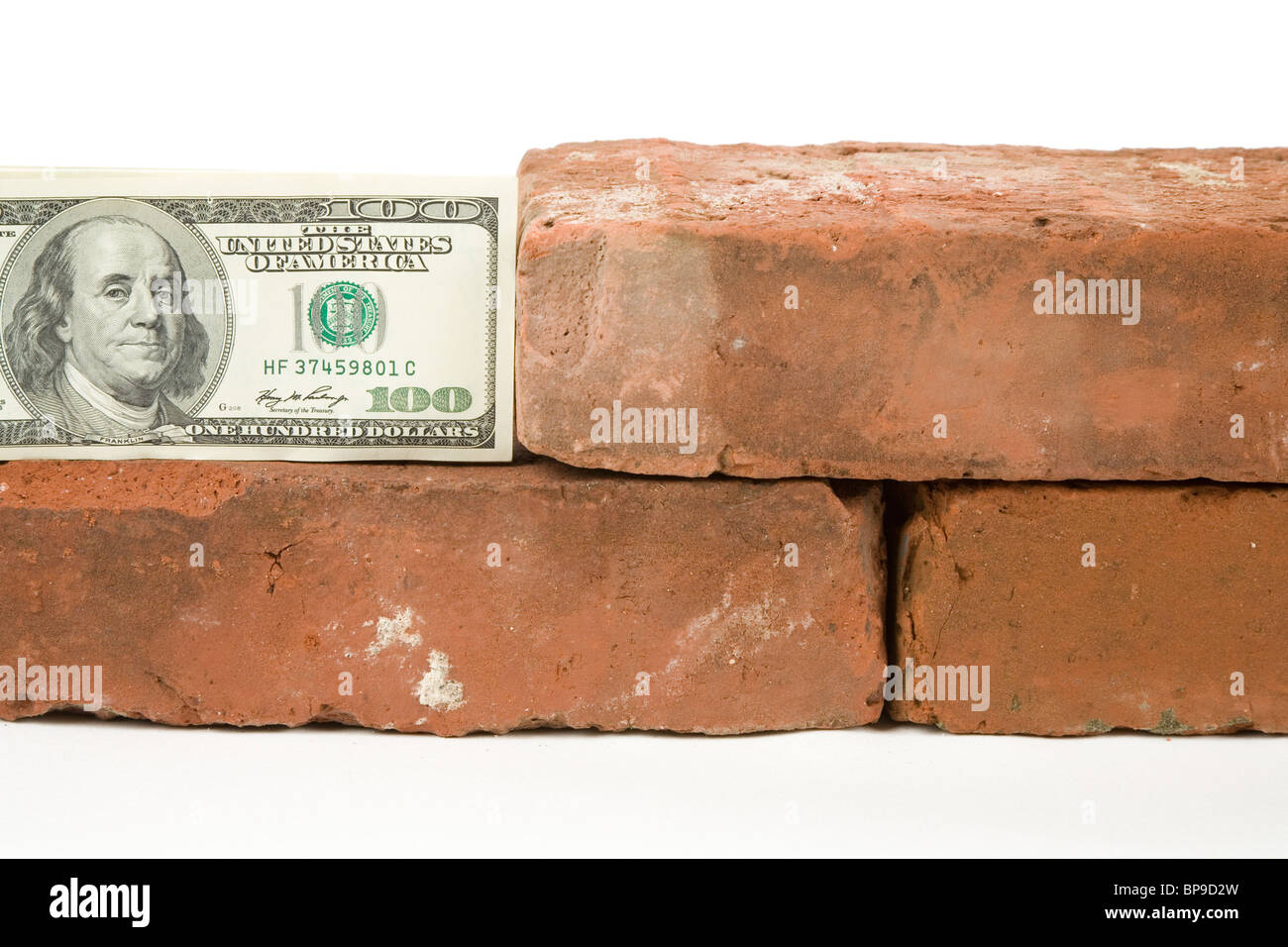 Red Brick and Dollar with white background Stock Photo Alamy