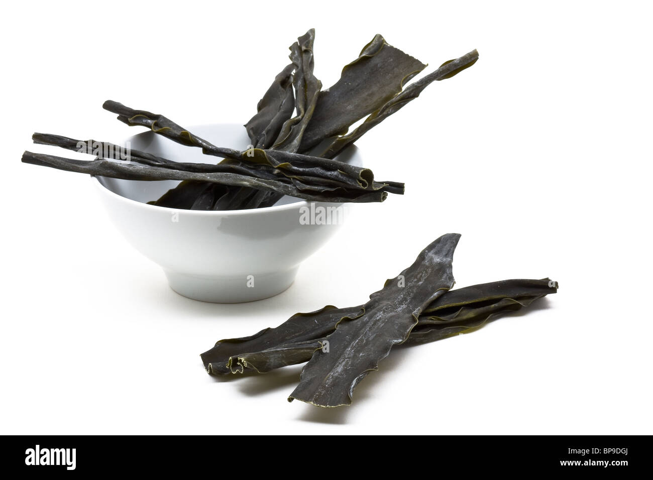 Kombu sea vegetable in bowl over white background Stock Photo Alamy