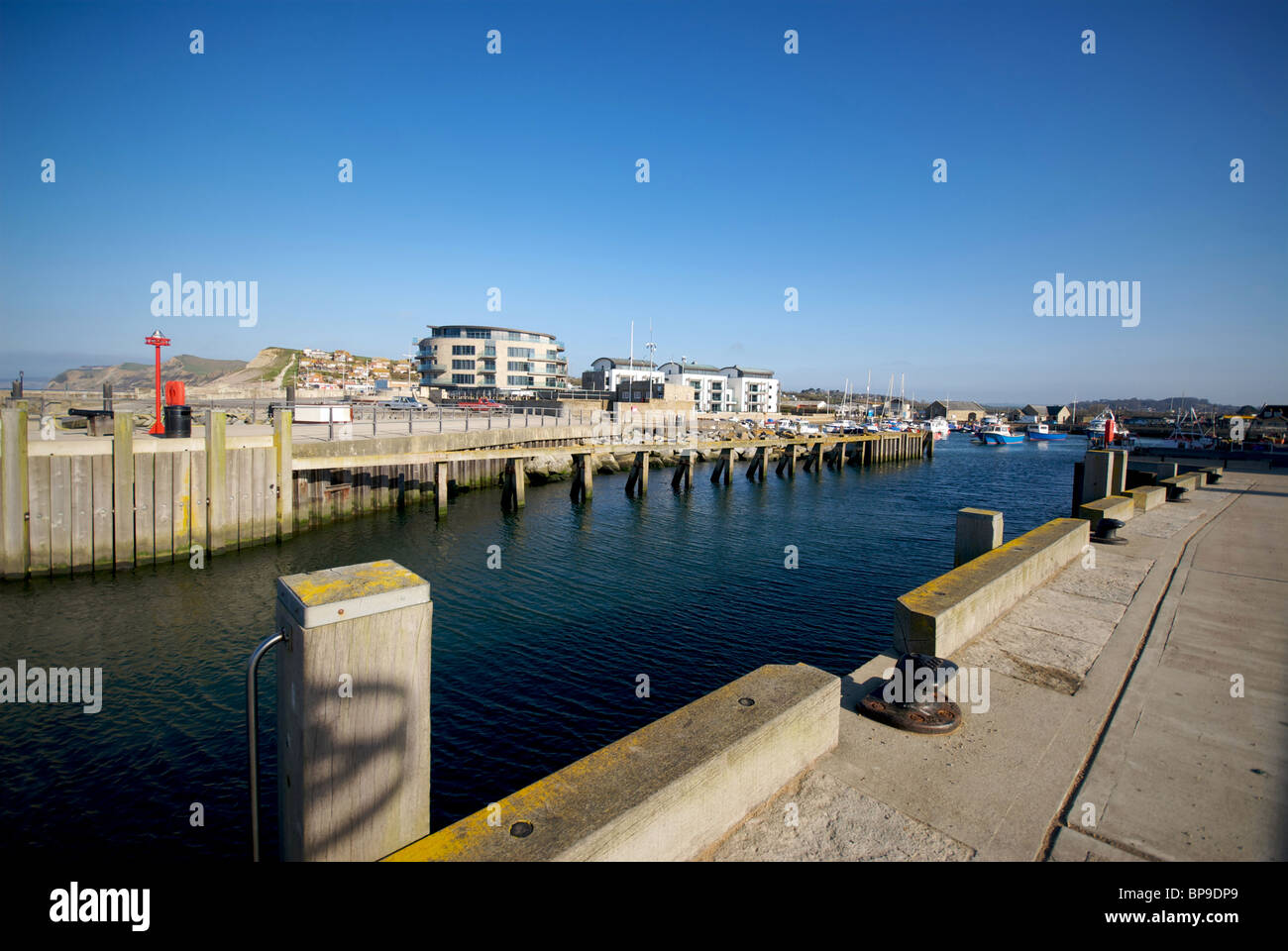 West Bay Dorset UK Harbor Harbour Quay Fishing Boats Stock Photo - Alamy