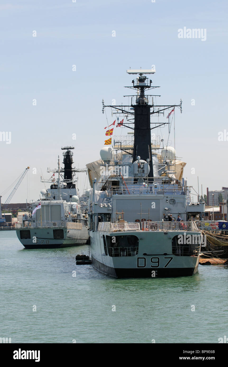 F78 HMS Kent a type 32 Frigate & D97 HMS Edinburgh a type 42 Destroyer alongside Royal navy Dockyard Portsmouth southern England Stock Photo