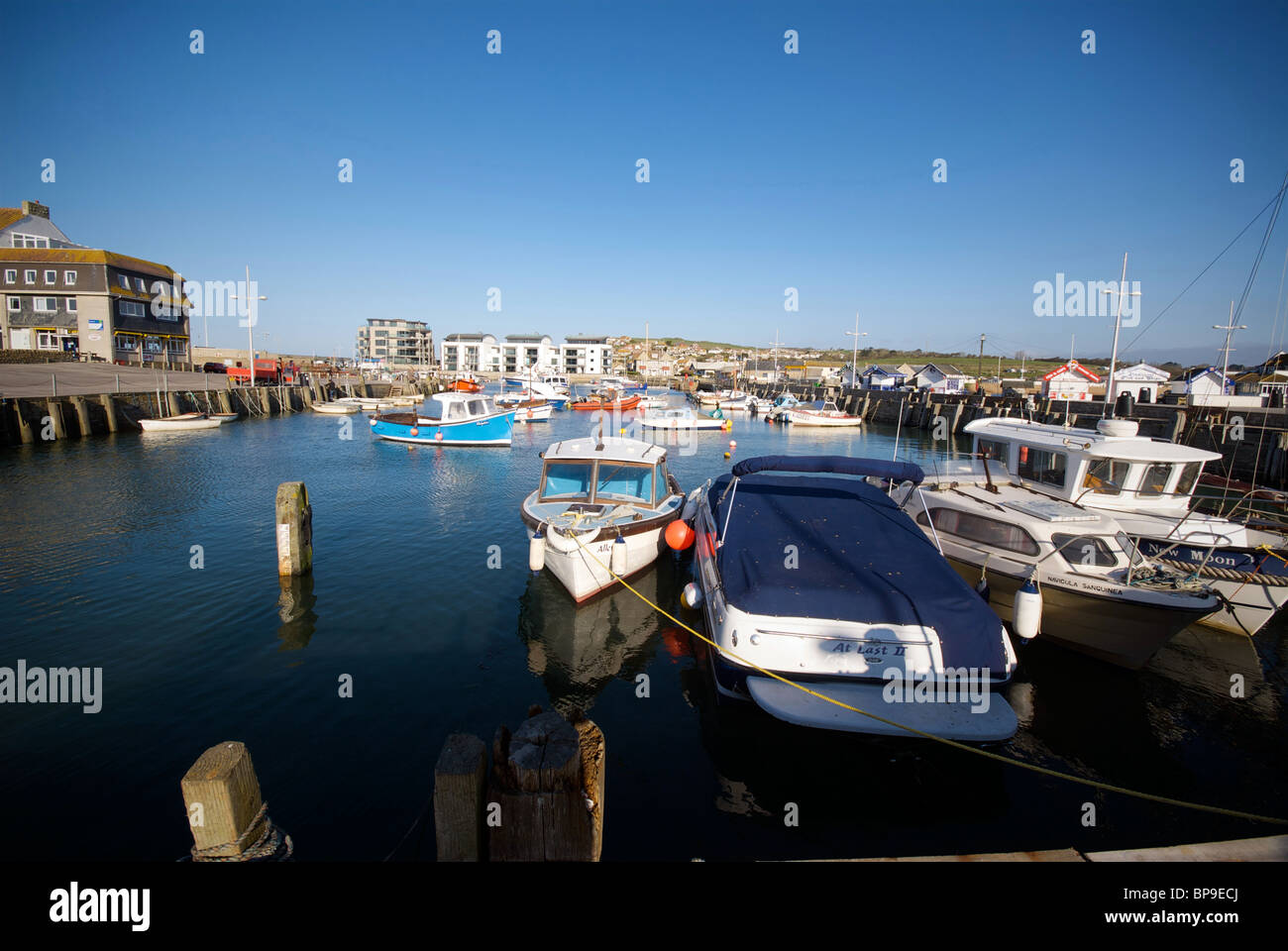 West Bay Dorset UK Harbor Harbour Quay Fishing Boats Stock Photo - Alamy
