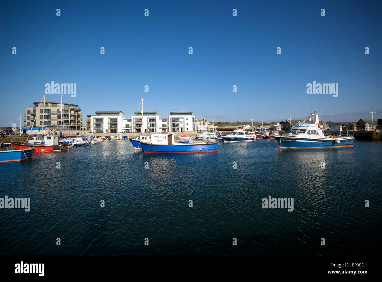 West Bay Dorset UK Harbor Harbour Quay Fishing Boats Stock Photo - Alamy