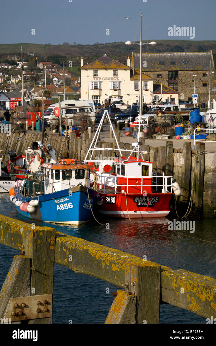 West Bay Dorset UK Harbor Harbour Quay Fishing Boats Stock Photo - Alamy