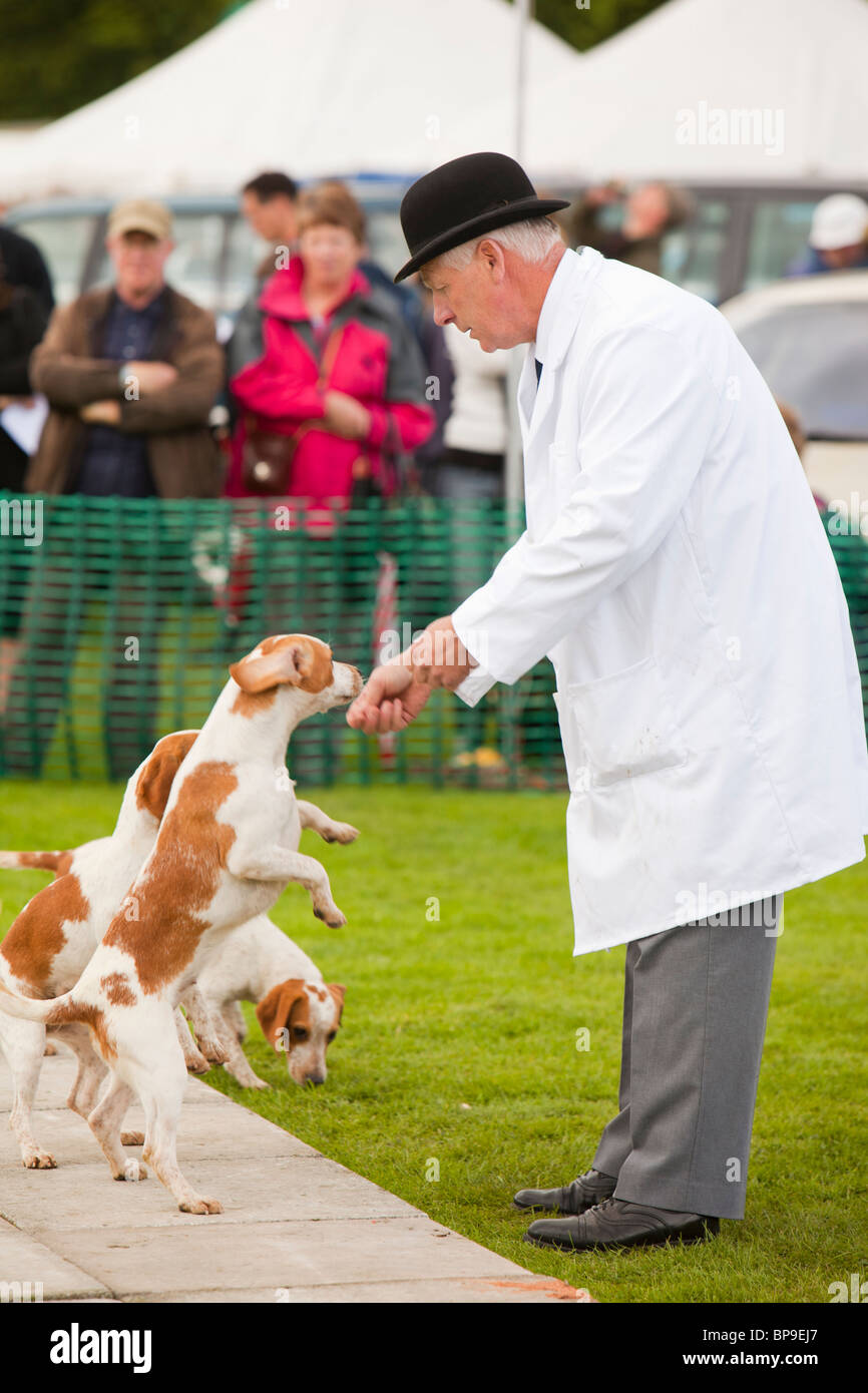 A man wearing the bowler hat and white coat, traditionally associated