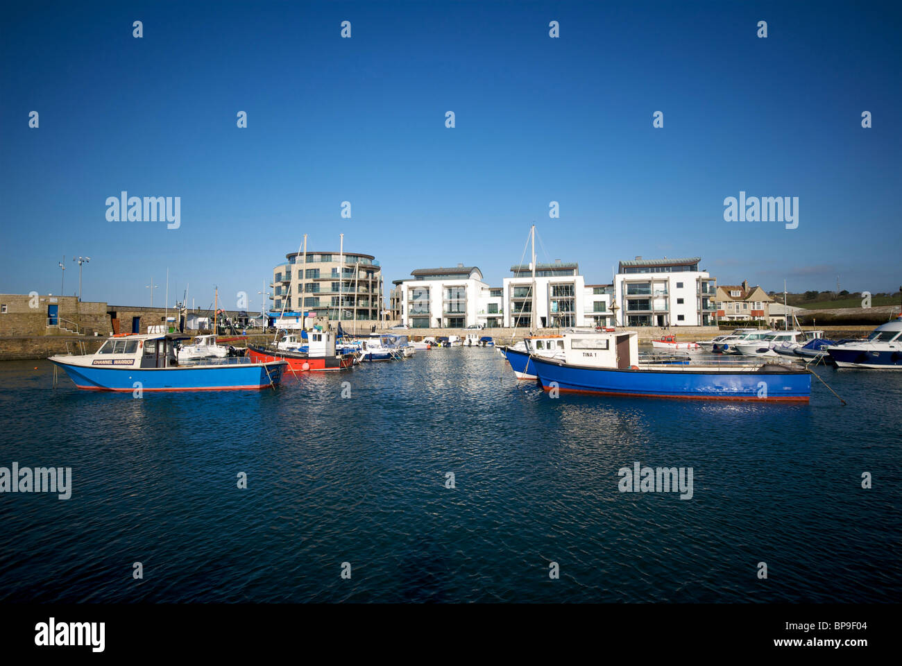 West Bay Dorset UK Harbor Harbour Quay Fishing Boats Stock Photo - Alamy