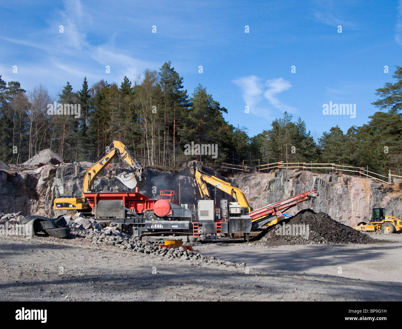 Construction site in Nyköping, Sweden. The mountain is being crushed and removed for the building of the new fire station. Stock Photo