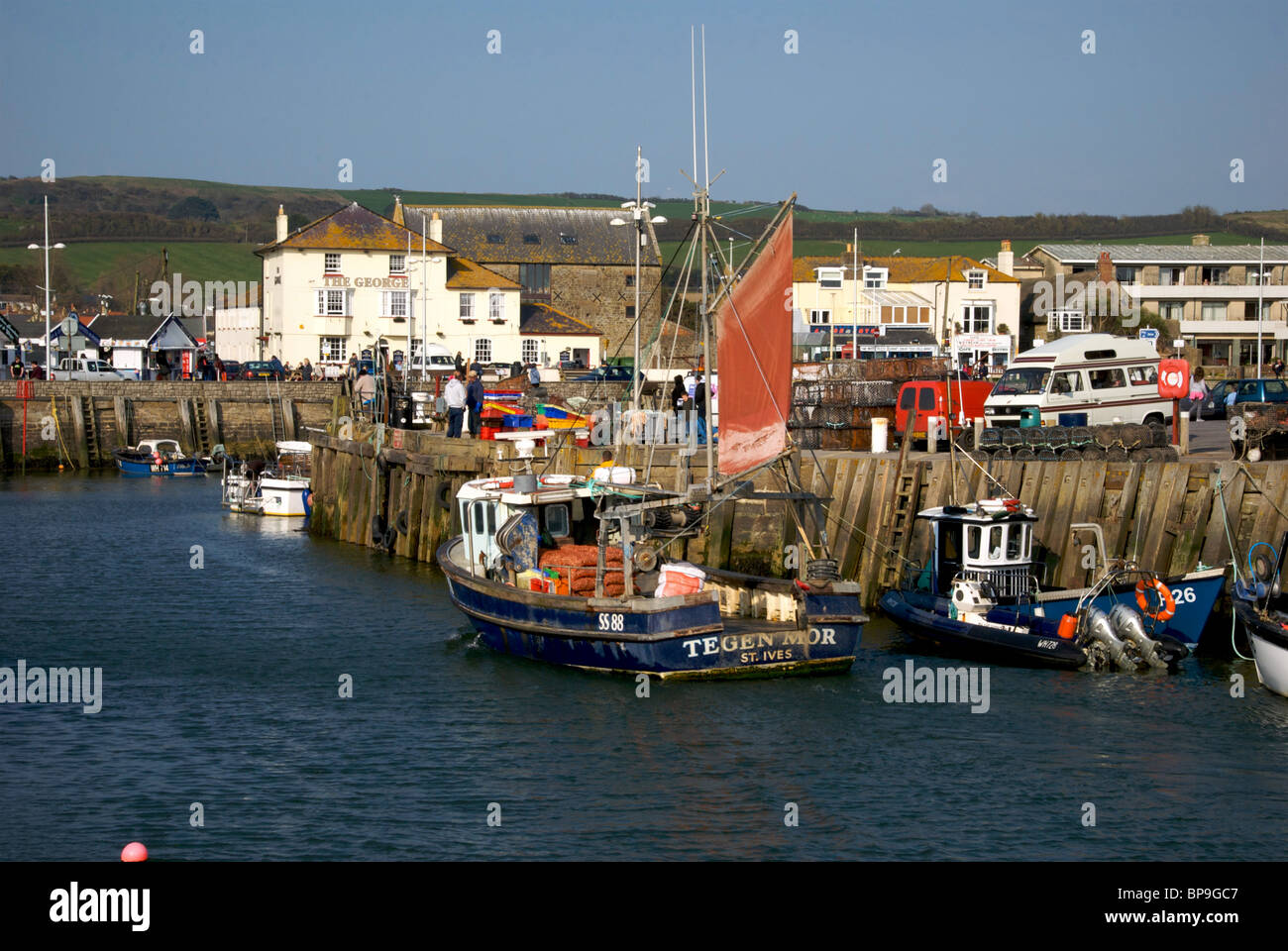 West Bay Dorset UK Harbor Harbour Quay Fishing Boats Stock Photo - Alamy