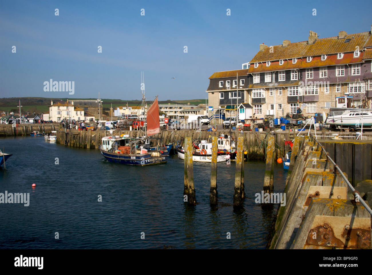 West Bay Dorset UK Harbor Harbour Quay Fishing Boats Stock Photo - Alamy